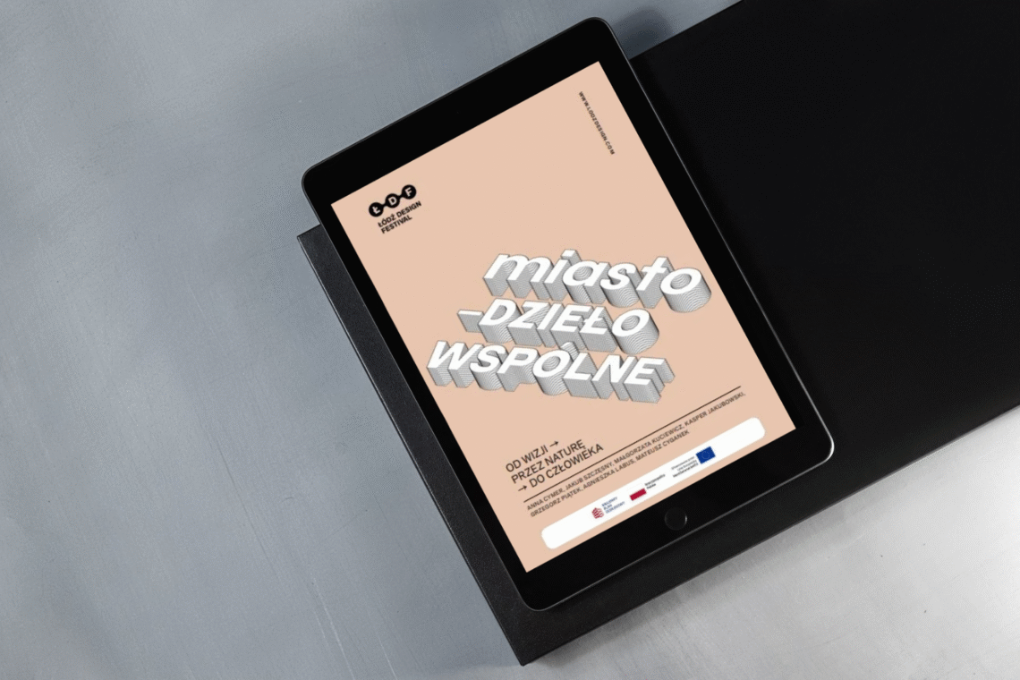 Grafika przedstawiająca iPad z wyświetloną publikacją "Miasto - dzieło wspólne"